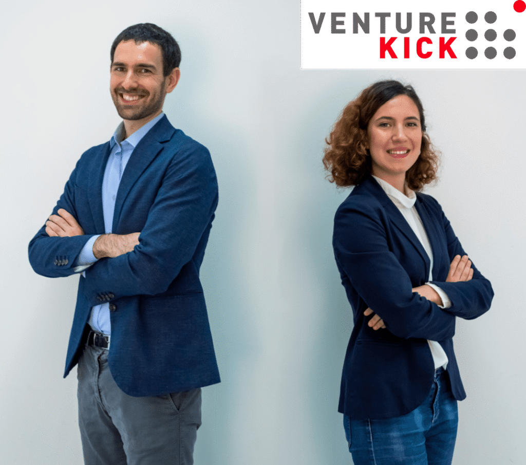 Frank Bonnet and Ana Hernando standing with the venture kick logo on the top